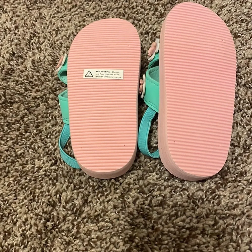 Delia’s light pink and aqua stripe floral accent sandals size 11/12T